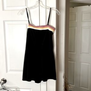 Summer terri /jumpsuit. Size small black with red and yellow piping